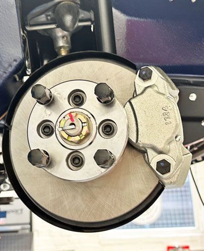 Standard brake kit being installed during classic Mini restoration build